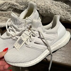 Women’s size 6 1/2. Brand new. Never worn. White Adidas Ultra Boost 4.0 DNA